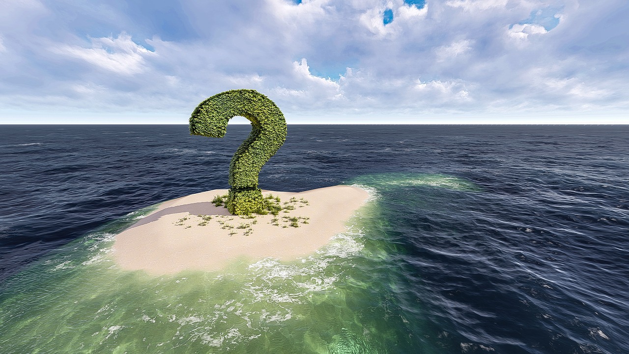 ilha, no meio do oceano, com um ponto de interrogação
